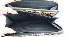 Load image into Gallery viewer, Louis Vuitton Wild at Heart Empreinte Zippy Wallet
