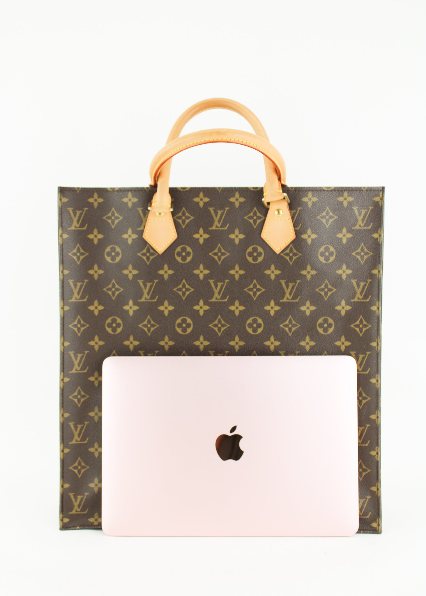 Sold at Auction: LOUIS VUITTON, A SAC PLAT TOTE STYLED IN MONOGRAM COATED  CANVAS WITH VACHETTA LEATHER TRIM, 37 X 36 X 9CM, A/F