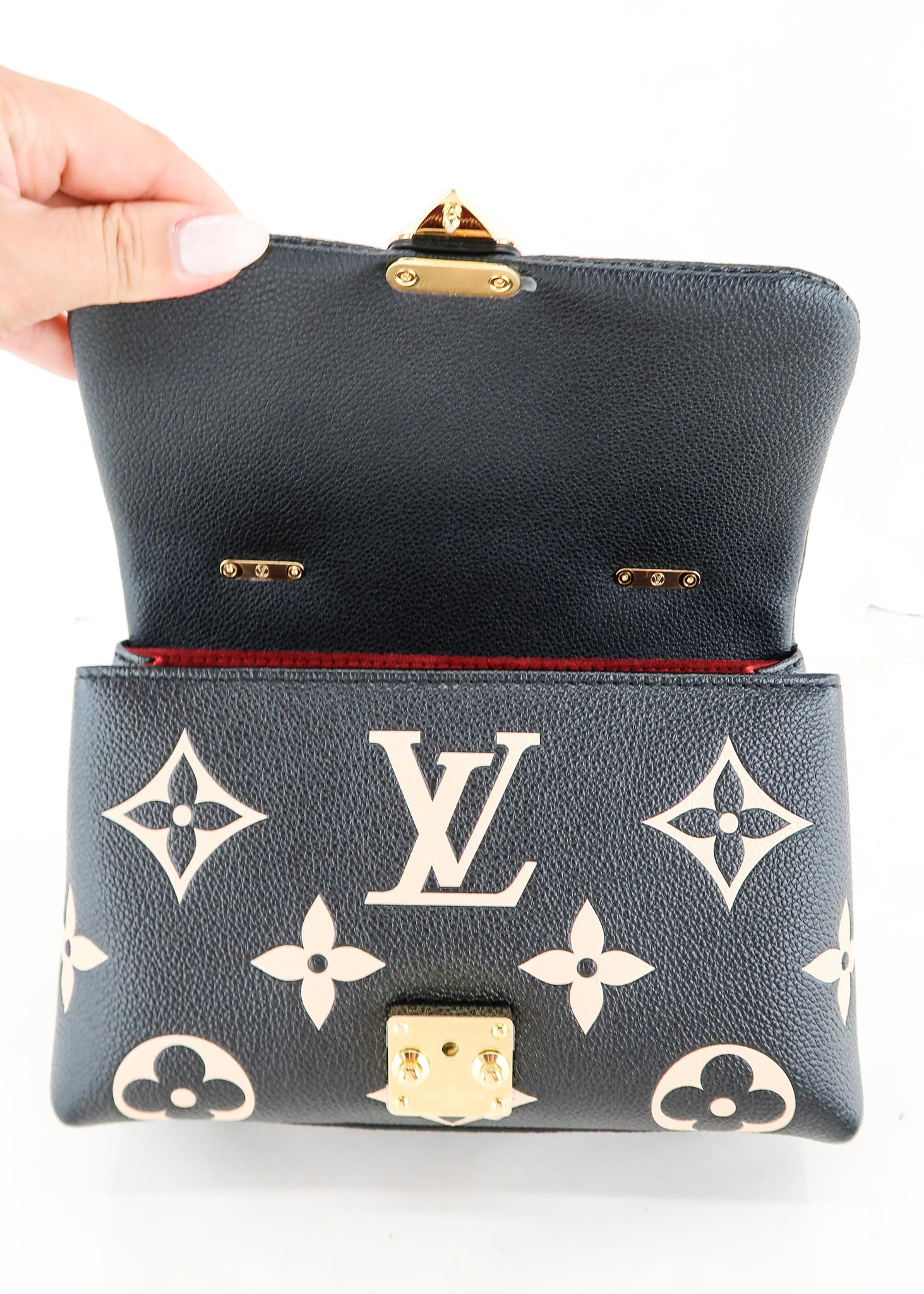 Louis Vuitton, Bags, Louis Vuitton Madeleine Handbag Bicolor Monogram  Empreinte Giant Bb Black