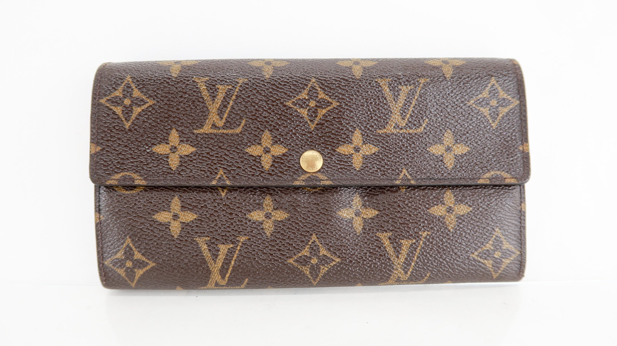 Louis Vuitton Sarah Wallet Monogram Brown in Coated Canvas with