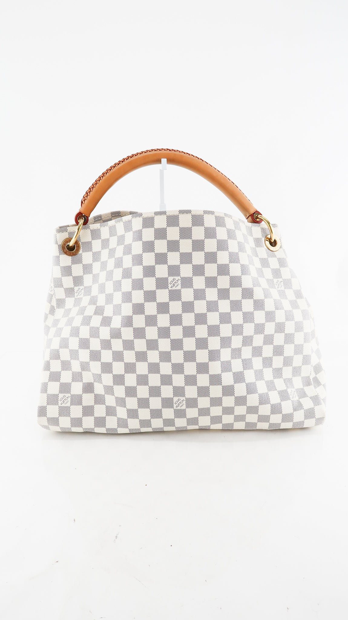 The Artsy MM features a damier azur canvas body, a rolled vachetta