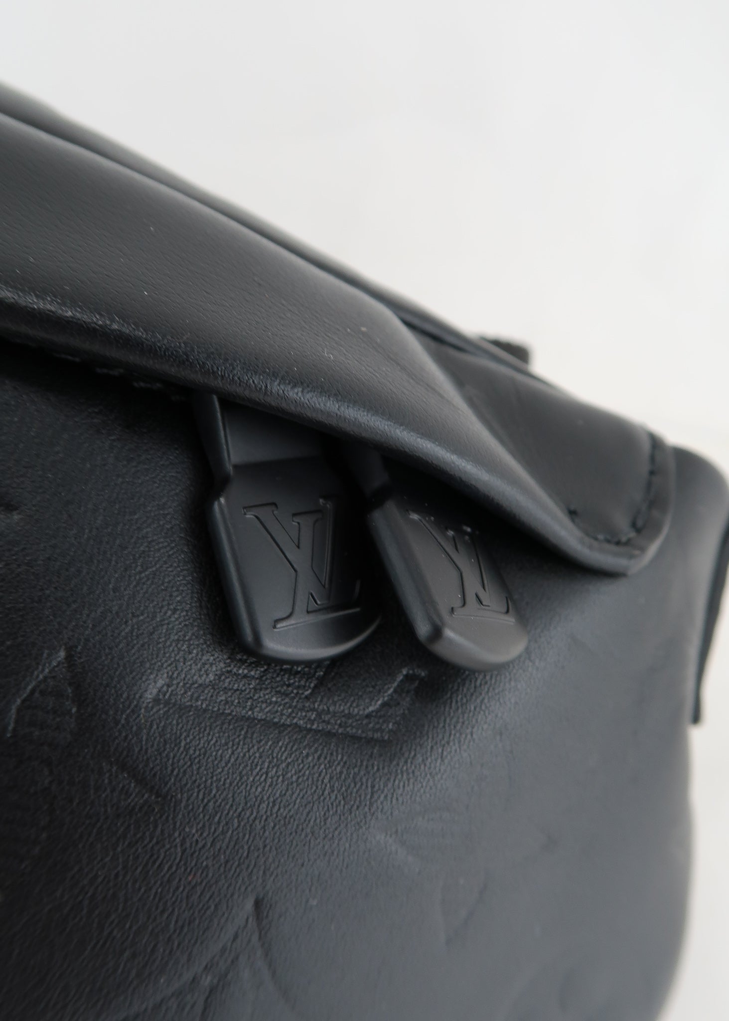 Louis Vuitton Discovery Bumbag Features monogram shadow calf